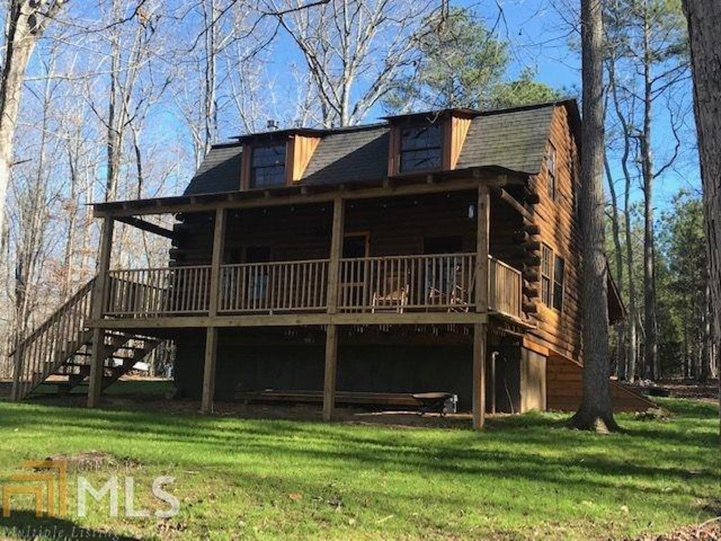 232 Flowers Road Molena, GA 30258 - Photo 1 of 1 a view of a house with a yard