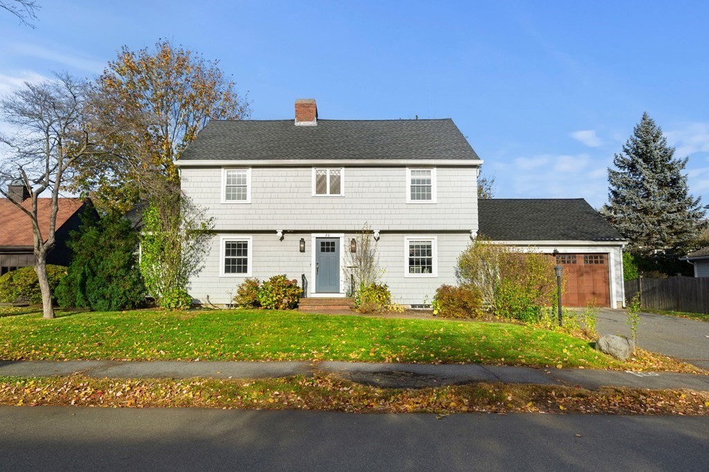 20 Shetland Road Marblehead, MA 01945 - Photo 1 of 40 a front view of a house with a yard and garage