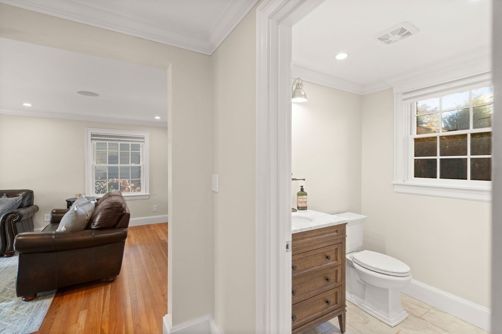 20 Shetland Road Marblehead, MA 01945 - Photo 18 of 40 a bathroom with a toilet sink a window and tub