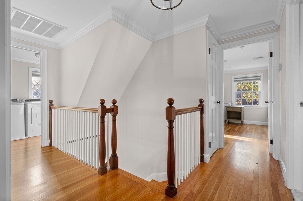 20 Shetland Road Marblehead, MA 01945 - Photo 22 of 40 a view of a hallway with wooden floor and entryway
