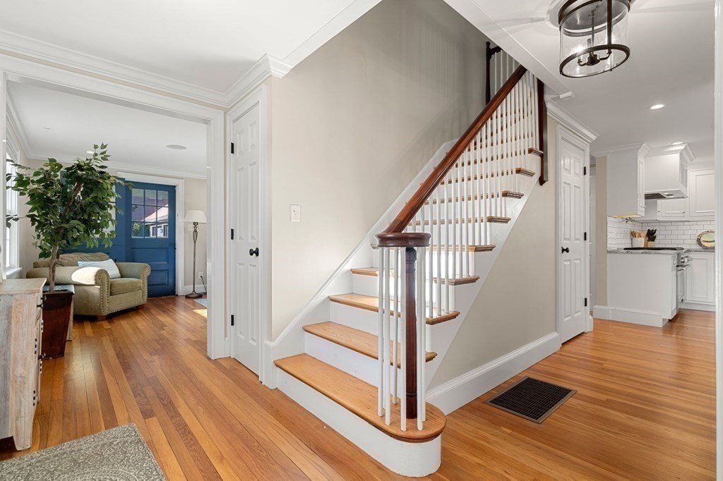 20 Shetland Road Marblehead, MA 01945 - Photo 7 of 40 a view of a livingroom with wooden floor and stairs
