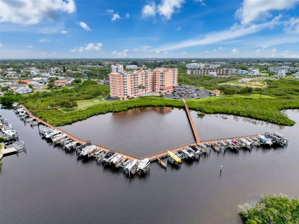 4516 Seagull Drive, Unit 615 New Port Richey, FL 34652 - Photo 26 of 45 an aerial view of a house with a garden and lake view