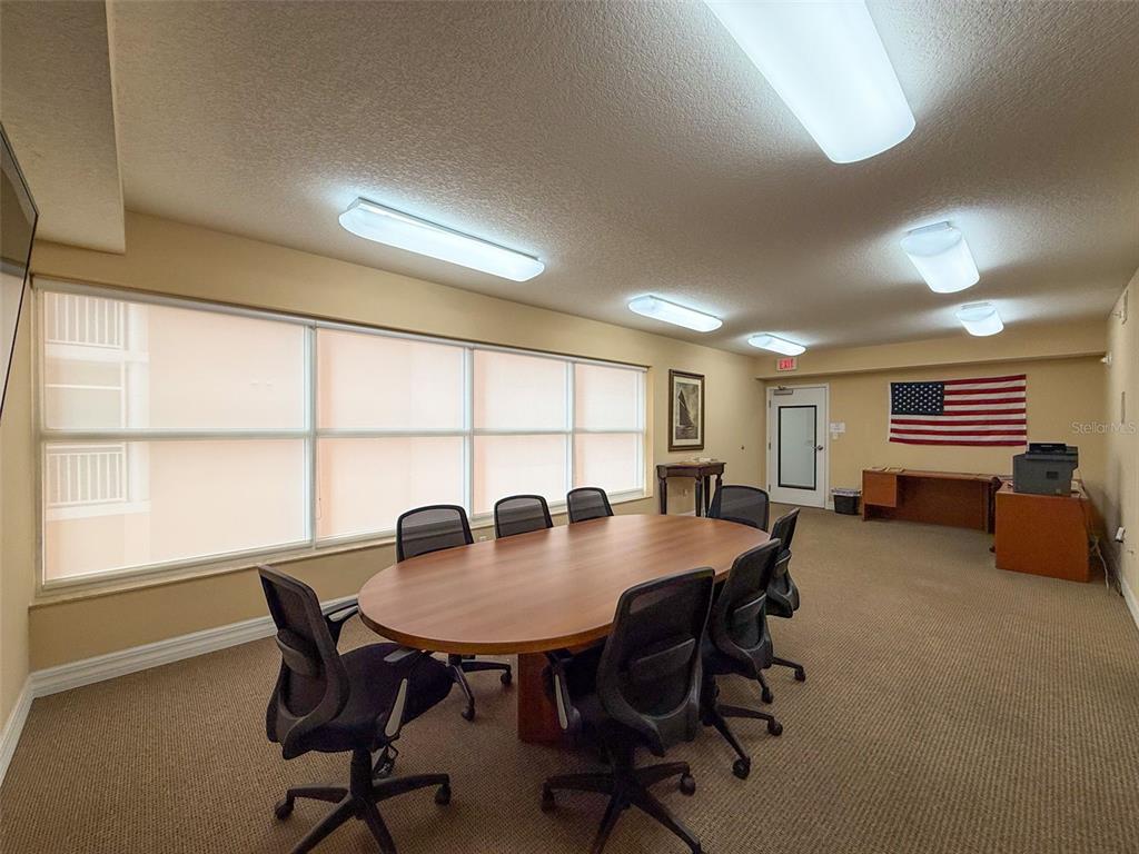 4516 Seagull Drive, Unit 615 New Port Richey, FL 34652 - Photo 30 of 45 a view of a dining room with furniture and a window