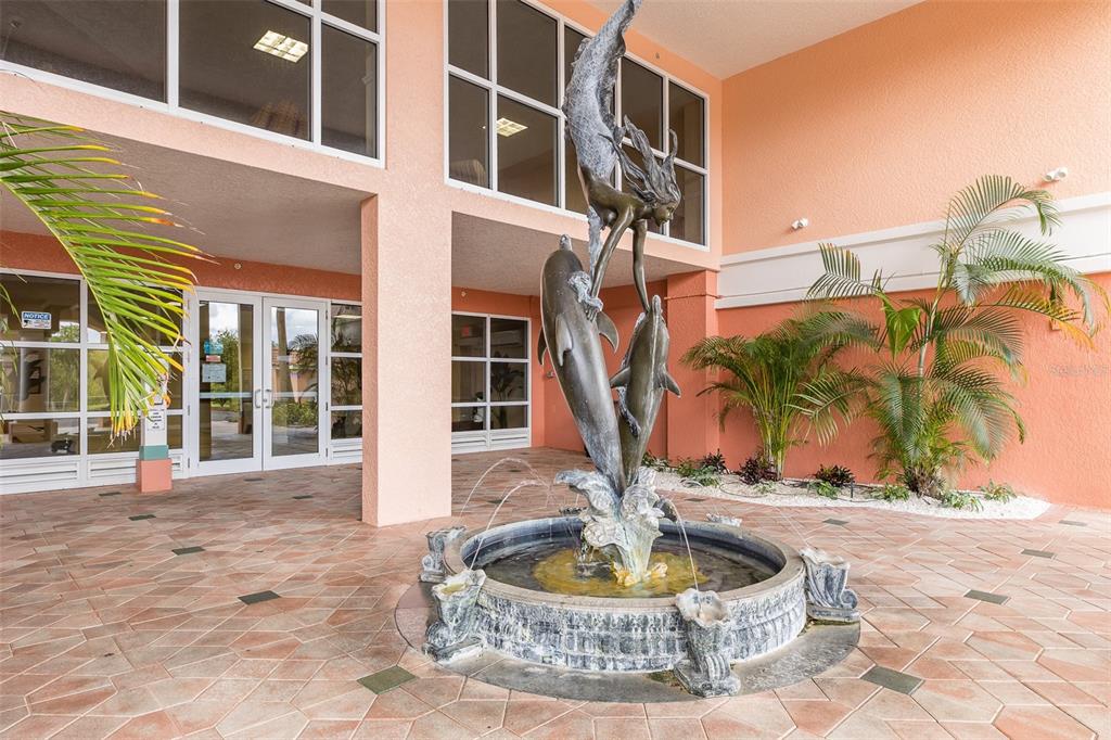 4516 Seagull Drive, Unit 615 New Port Richey, FL 34652 - Photo 45 of 45 a water fountain in front of a building
