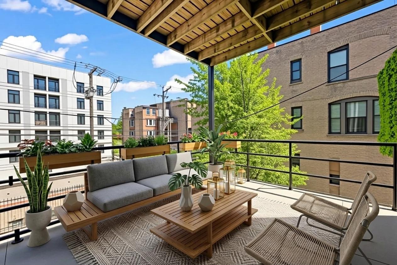 2710 West Haddon Avenue, Unit 2 Chicago, IL 60622 - Photo 10 of 11 a view of a patio with couches and a potted plant