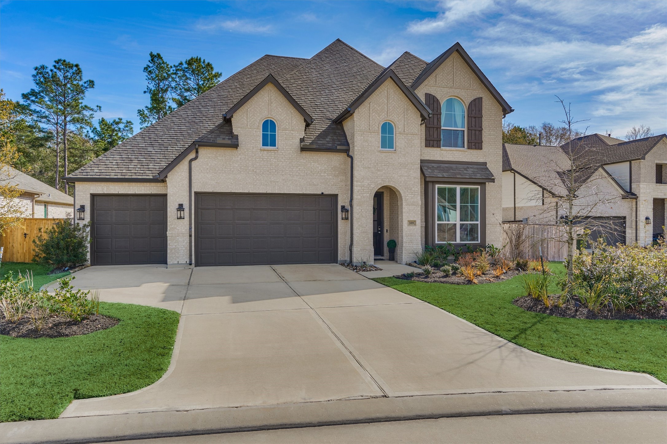 335 Samuels Link Lane Montgomery, TX 77316 - Photo 1 of 45 a front view of a house with a yard and garage