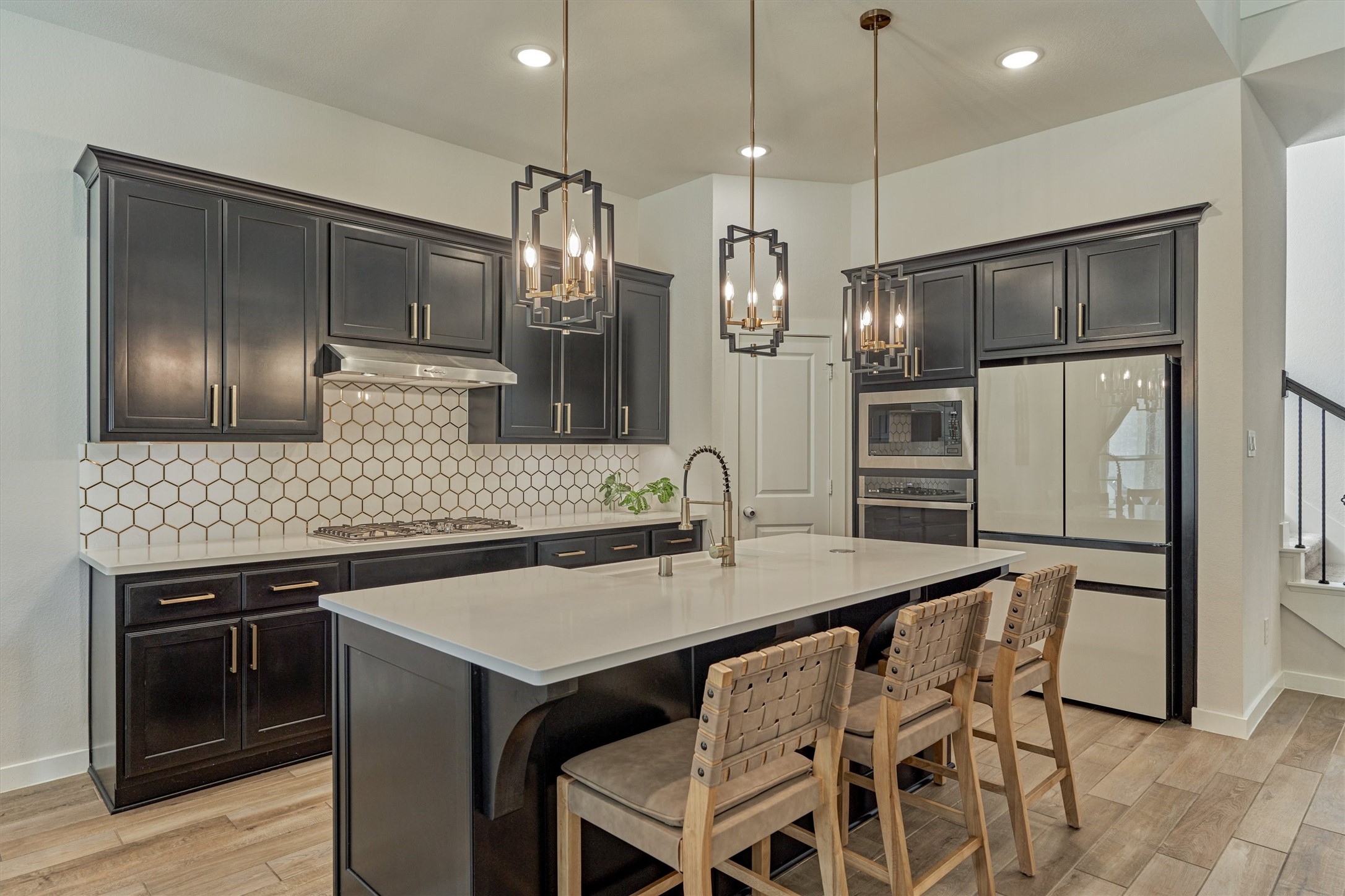 335 Samuels Link Lane Montgomery, TX 77316 - Photo 12 of 45 a kitchen with stainless steel appliances granite countertop a sink a stove a refrigerator and island