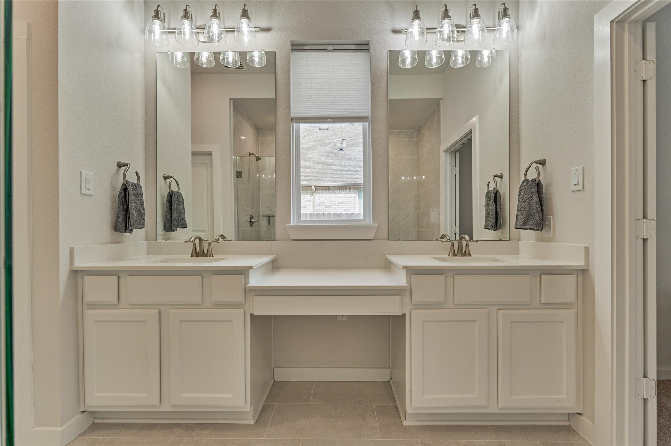 335 Samuels Link Lane Montgomery, TX 77316 - Photo 19 of 45 a bathroom with a sink vanity and a mirror