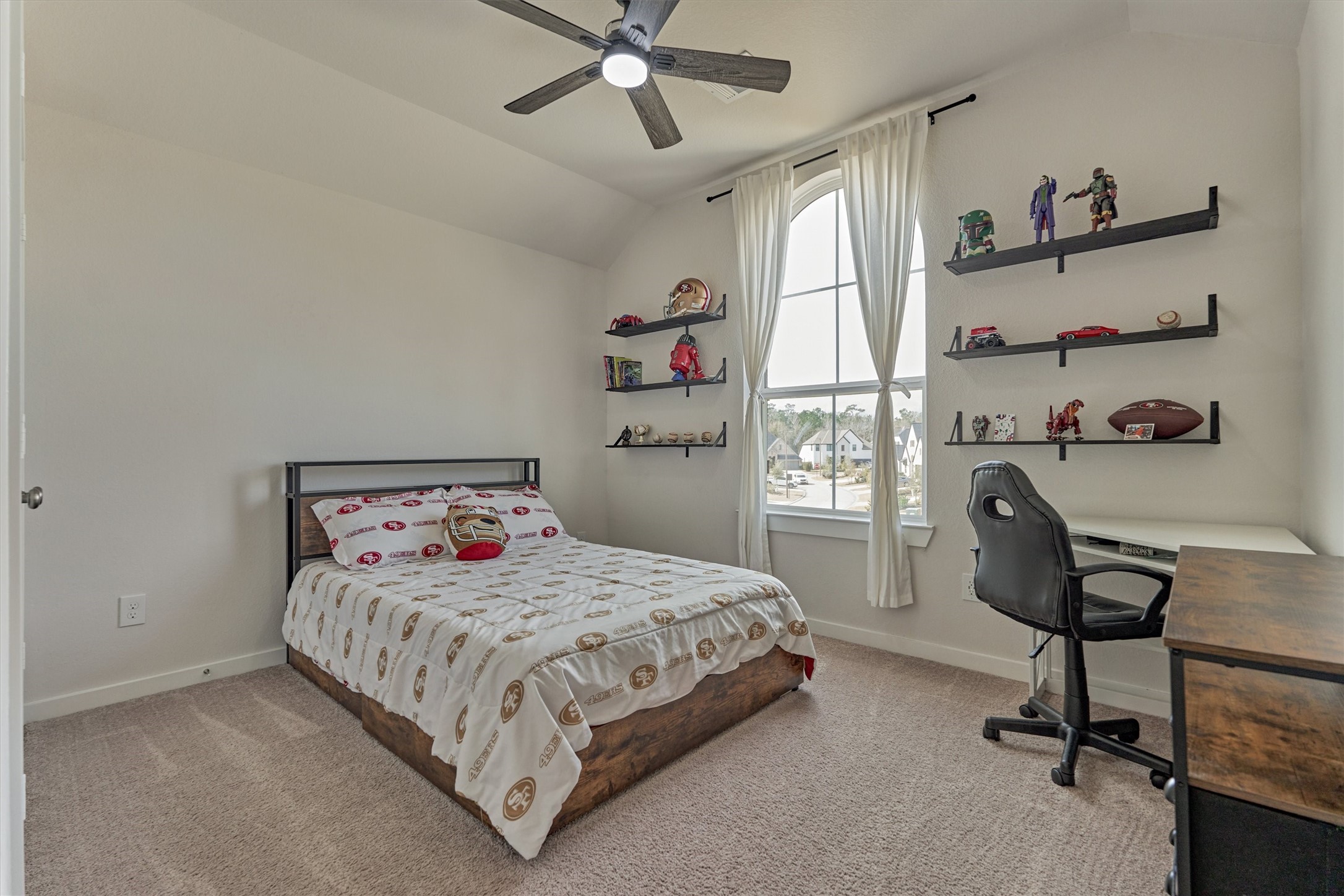 335 Samuels Link Lane Montgomery, TX 77316 - Photo 23 of 45 a bedroom with a bed a chair and a large window