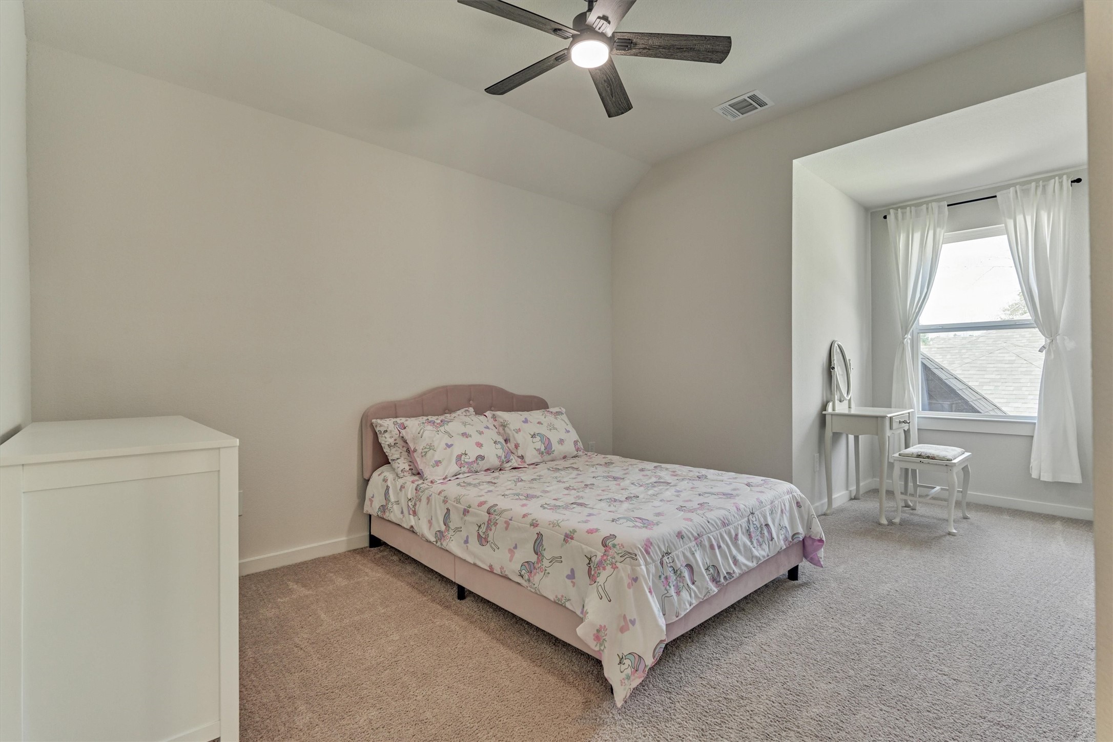 335 Samuels Link Lane Montgomery, TX 77316 - Photo 26 of 45 a bedroom with a bed and a window