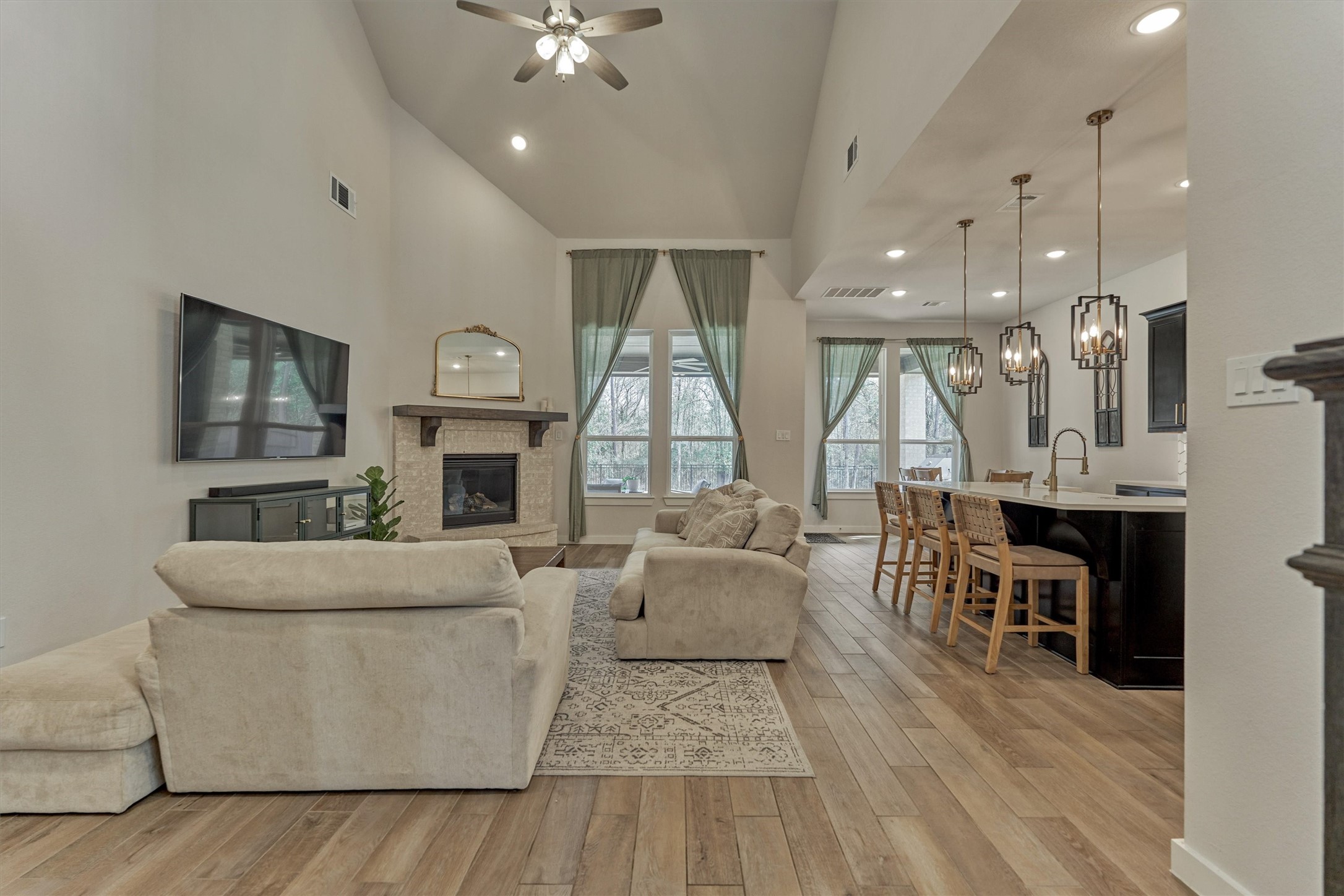 335 Samuels Link Lane Montgomery, TX 77316 - Photo 10 of 45 a living room with fireplace furniture and a wooden floor