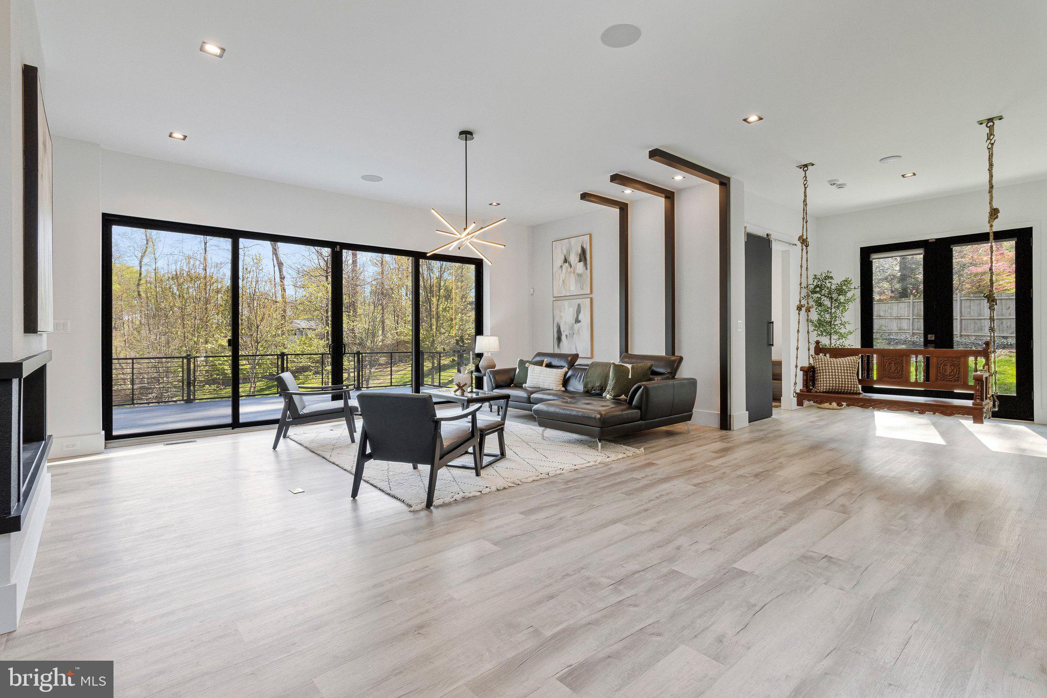 3525 Glenbrook Road Fairfax, VA 22031 - Photo 12 of 111 a living room with furniture and a large window