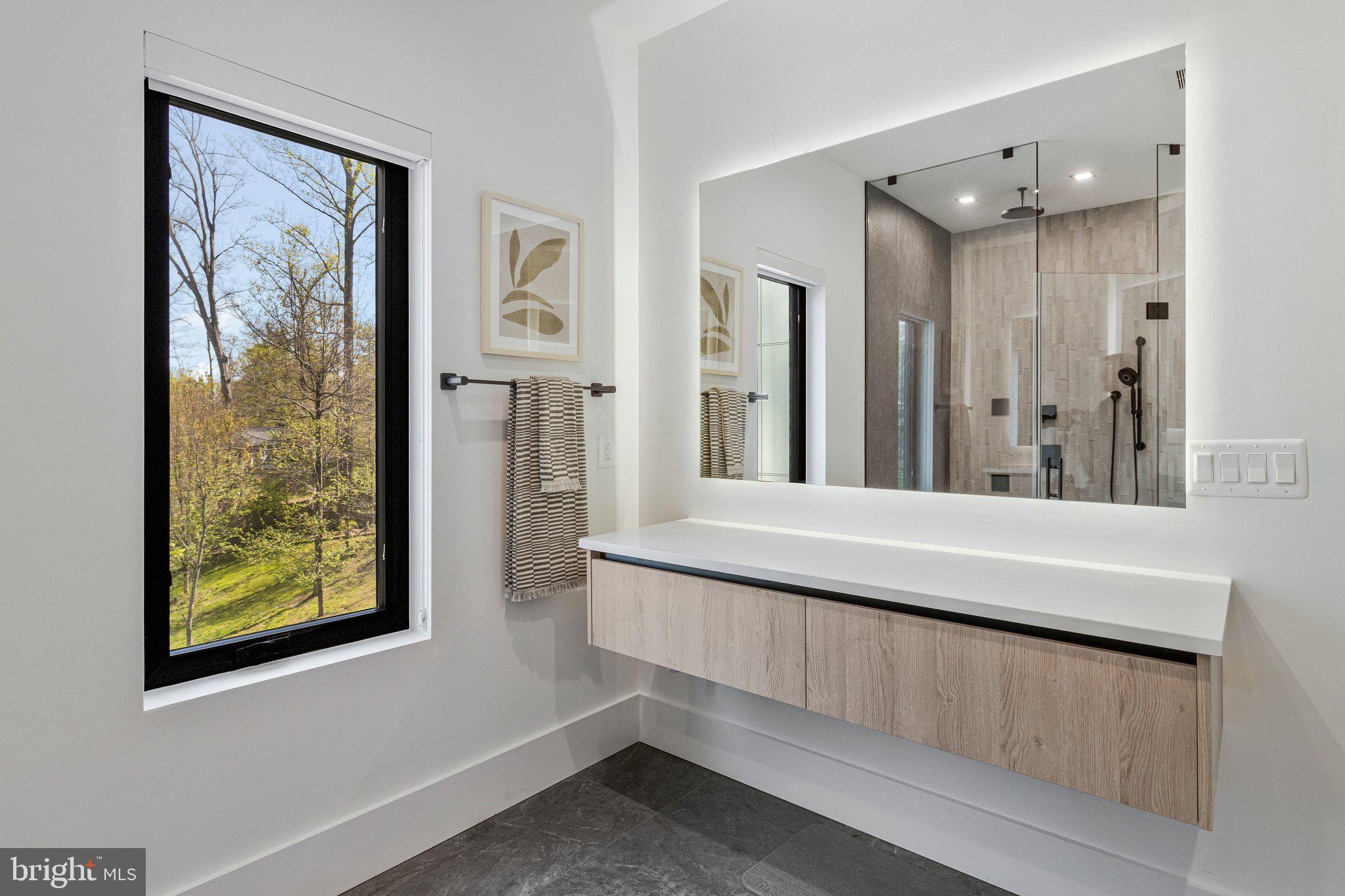 3525 Glenbrook Road Fairfax, VA 22031 - Photo 59 of 111 a view of a hallway with windows and chandelier