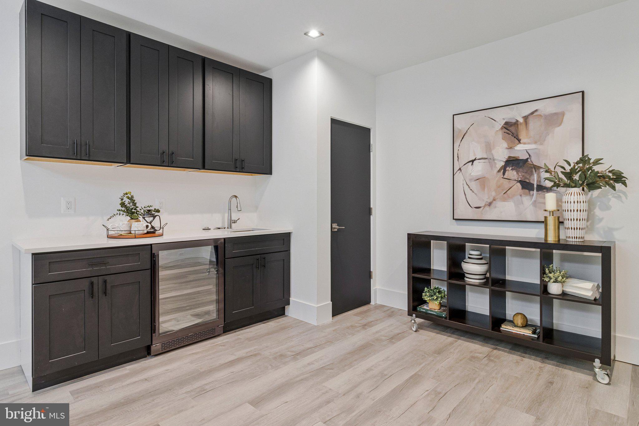 3525 Glenbrook Road Fairfax, VA 22031 - Photo 71 of 111 a spacious bathroom with a double vanity sink and a large mirror