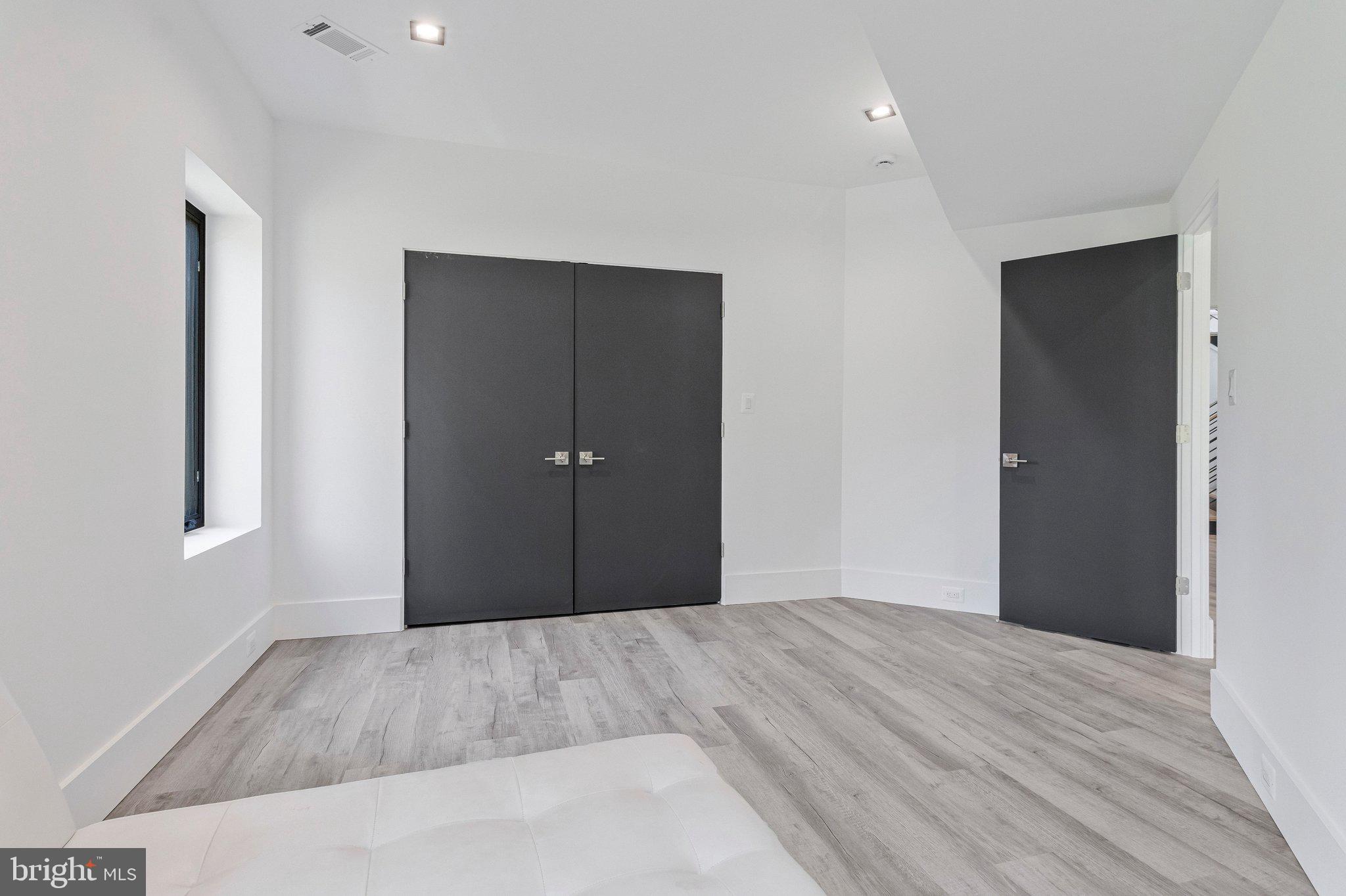 3525 Glenbrook Road Fairfax, VA 22031 - Photo 76 of 111 a view of a room with a wooden floor and bathroom
