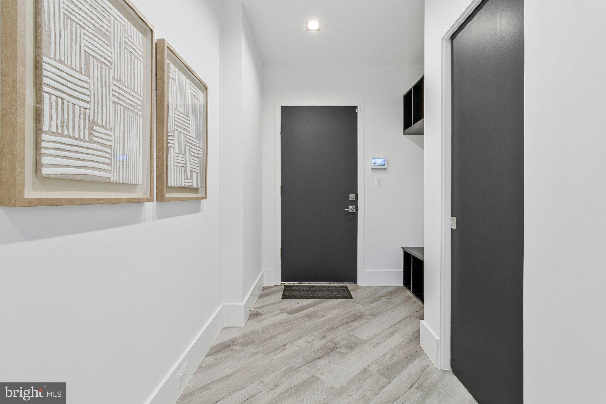 3525 Glenbrook Road Fairfax, VA 22031 - Photo 82 of 111 a view of an empty room with wooden floor and a window