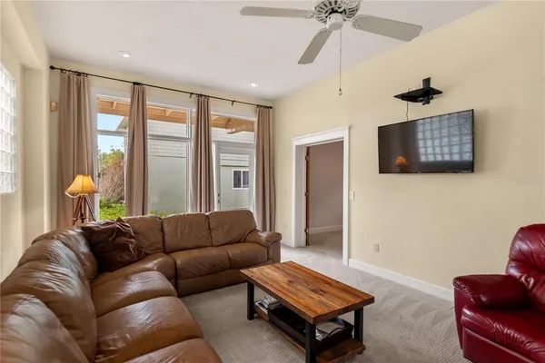 a living room with furniture and a window
