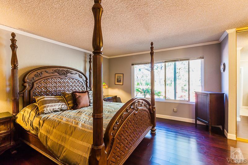 1291 Old Ranch Road Camarillo, CA 93012 - Photo 15 of 41 a bed sitting in a bedroom next to a window