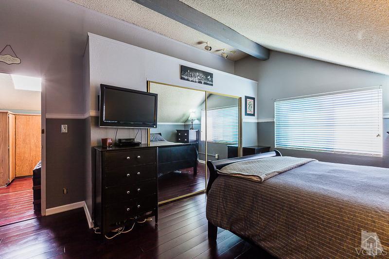 1291 Old Ranch Road Camarillo, CA 93012 - Photo 25 of 41 a bedroom with a bed and a flat screen tv