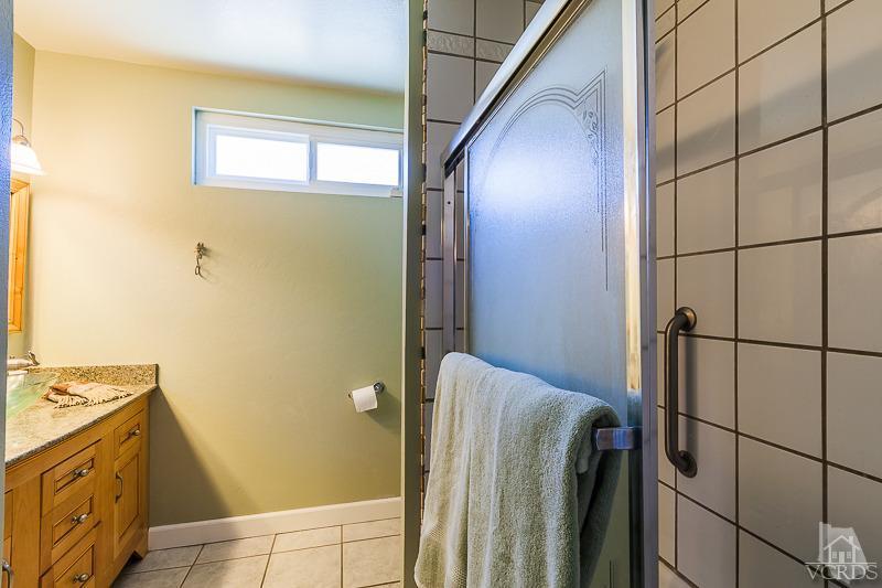 1291 Old Ranch Road Camarillo, CA 93012 - Photo 31 of 41 a bathroom with a sink and a mirror