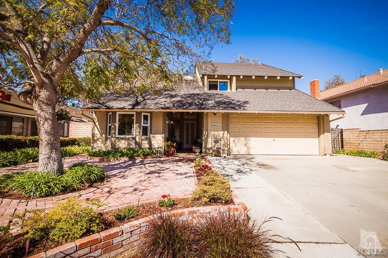 1291 Old Ranch Road Camarillo, CA 93012 - Photo 38 of 41 a front view of a house with a yard and potted plants