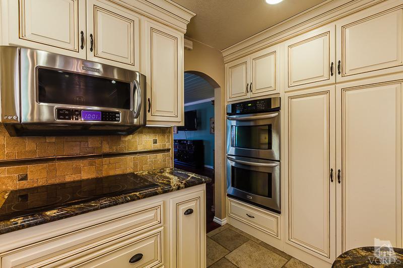 1291 Old Ranch Road Camarillo, CA 93012 - Photo 7 of 41 a kitchen with granite countertop cabinets stainless steel appliances and a counter space