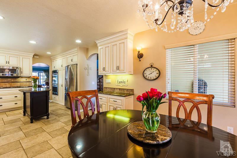 1291 Old Ranch Road Camarillo, CA 93012 - Photo 9 of 41 a dining room with furniture and chandelier
