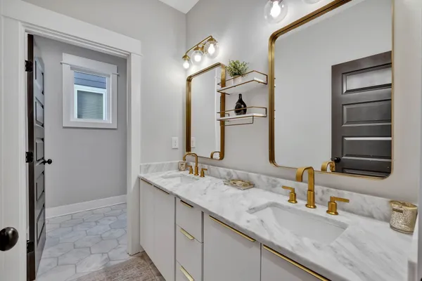 a bedroom with furniture and window