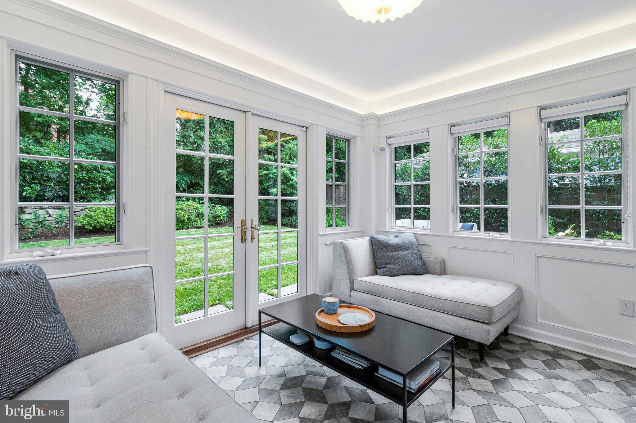 4745 Reservoir Road Northwest Washington, DC 20007 - Photo 22 of 47 Sunroom with expansive casement windows.