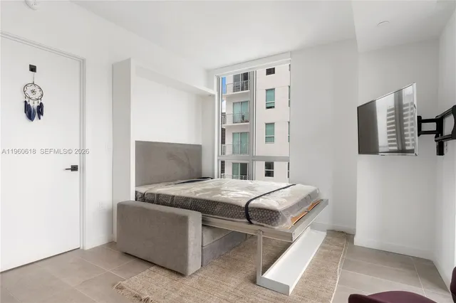 a living room with furniture and a couch