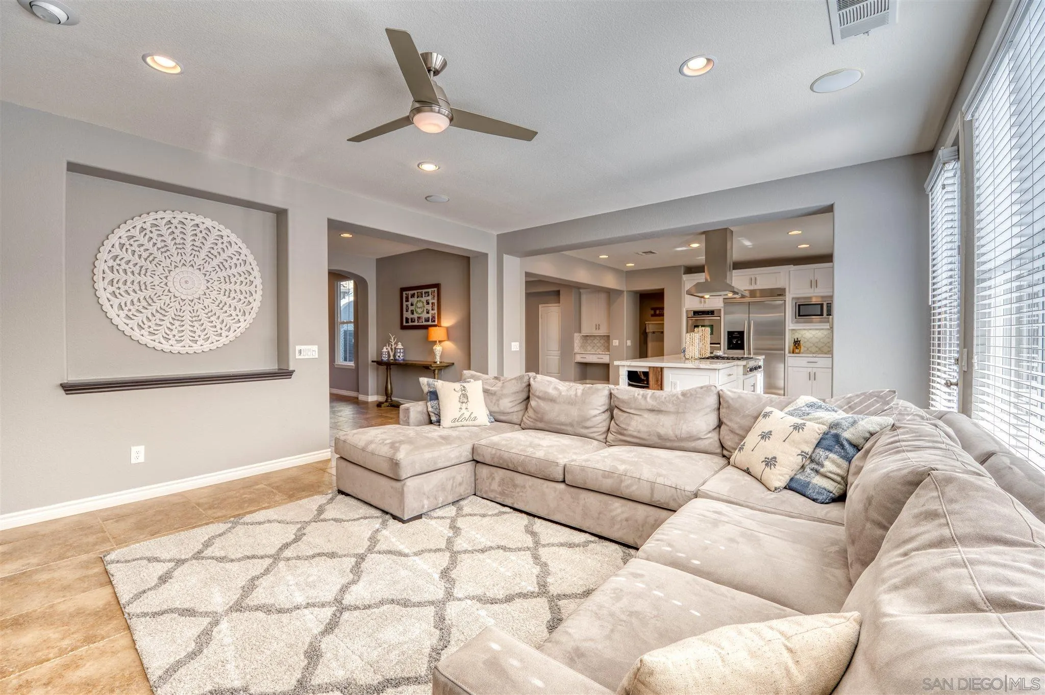 7432 Circulo Sequoia Carlsbad, CA 92009 - Photo 11 of 51 a living room with furniture and a large window