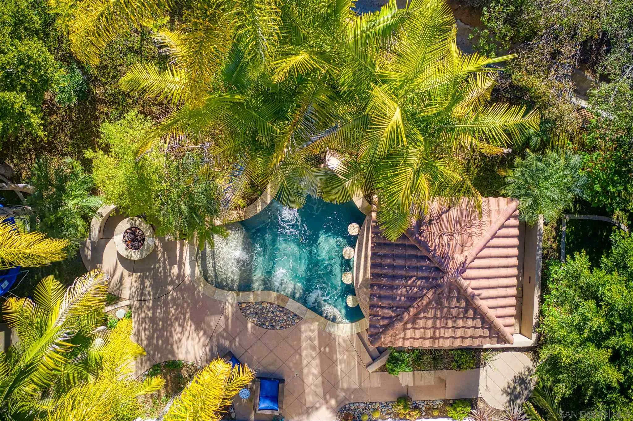 7432 Circulo Sequoia Carlsbad, CA 92009 - Photo 39 of 51 a front view of a house with garden