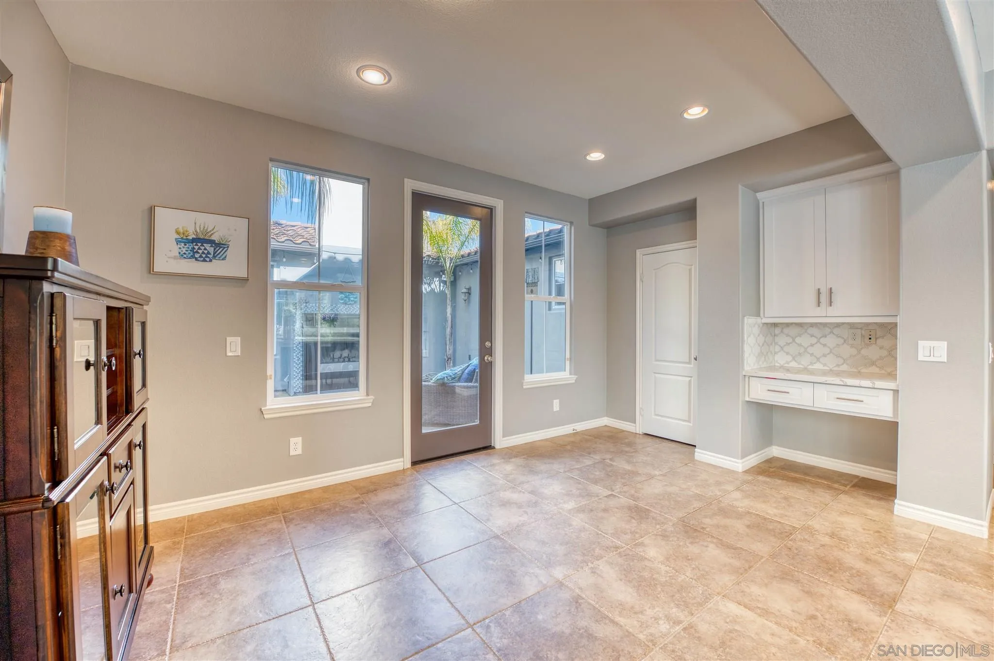 7432 Circulo Sequoia Carlsbad, CA 92009 - Photo 9 of 51 a view of an empty room with a window