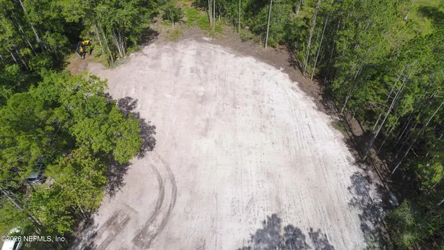 a view of backyard with green space