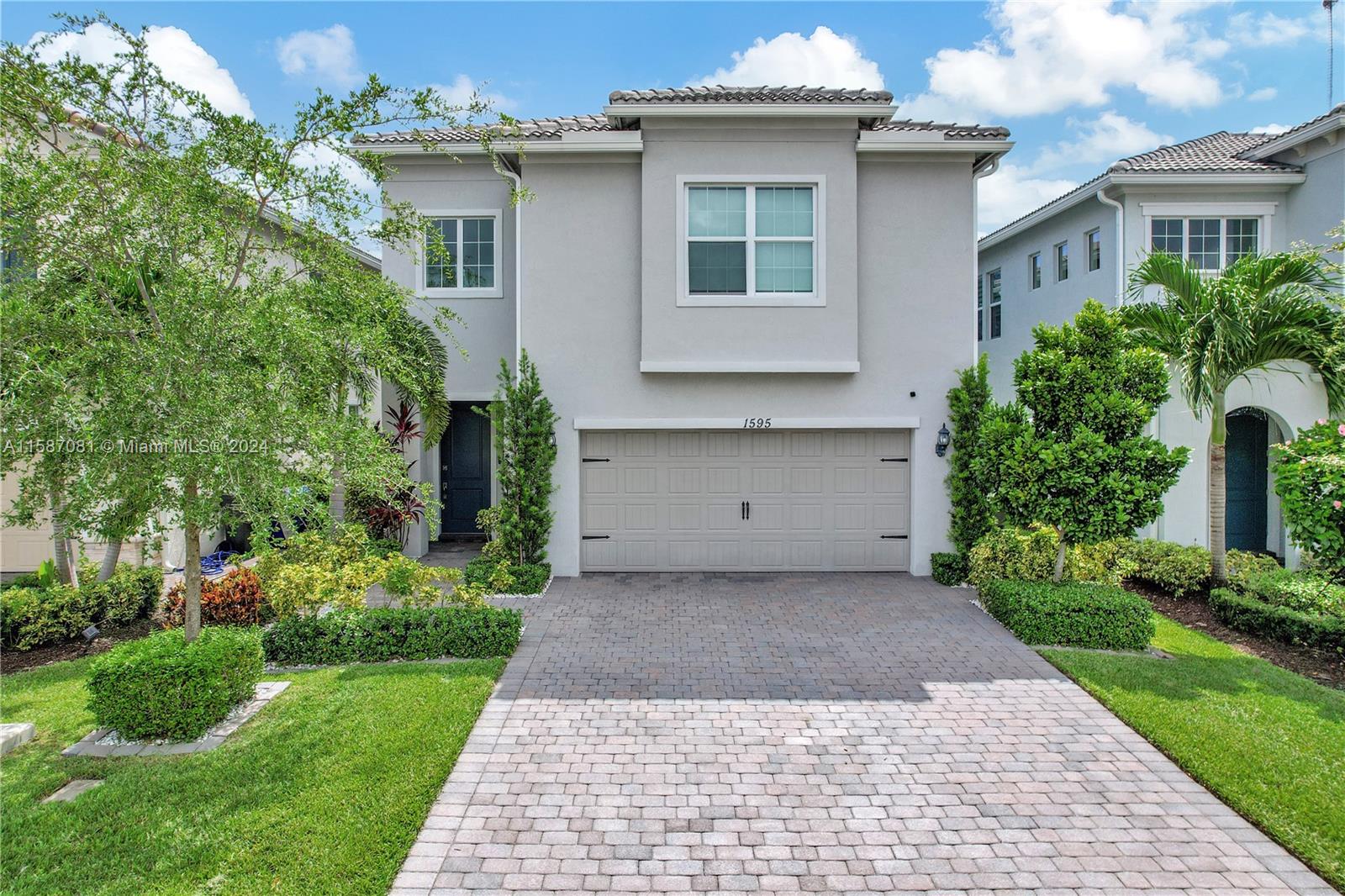 1595 Trailhead Terrace Hollywood, FL 33021 - Photo 1 of 49 a view of a house with a yard