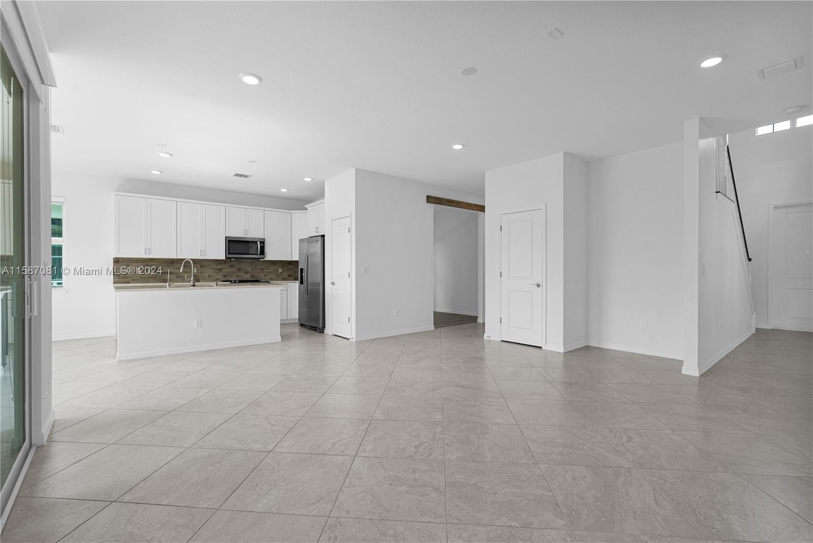 1595 Trailhead Terrace Hollywood, FL 33021 - Photo 21 of 49 a view of a kitchen with a sink and a refrigerator