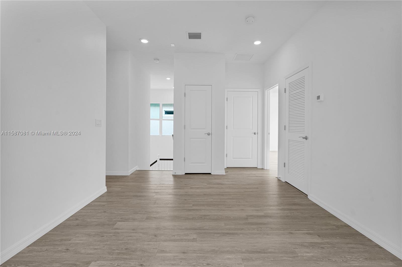 1595 Trailhead Terrace Hollywood, FL 33021 - Photo 30 of 49 a view of an empty room with wooden floor