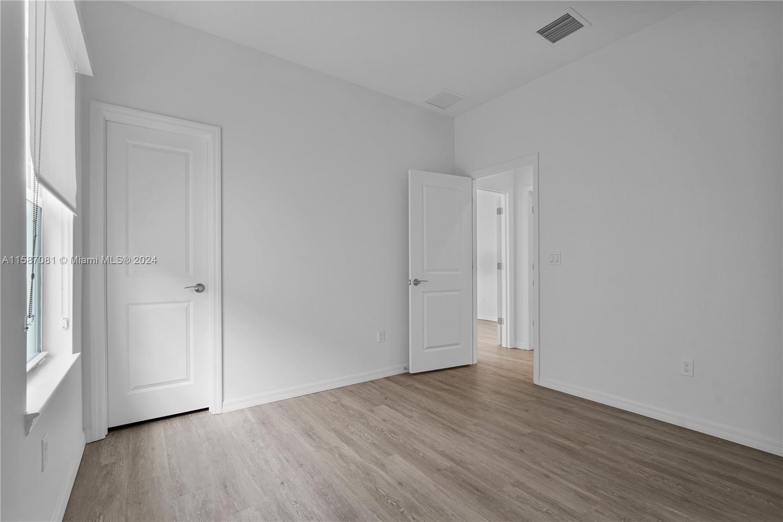 1595 Trailhead Terrace Hollywood, FL 33021 - Photo 35 of 49 a view of an empty room with wooden floor