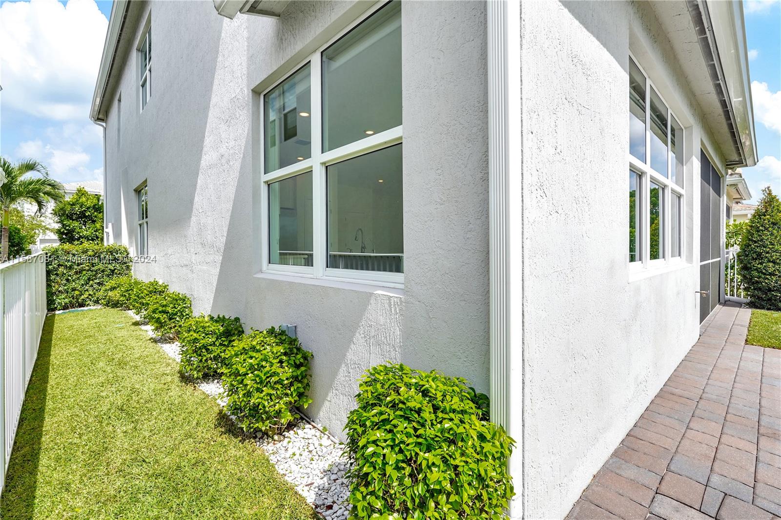 1595 Trailhead Terrace Hollywood, FL 33021 - Photo 39 of 49 a view of a house with a flower garden