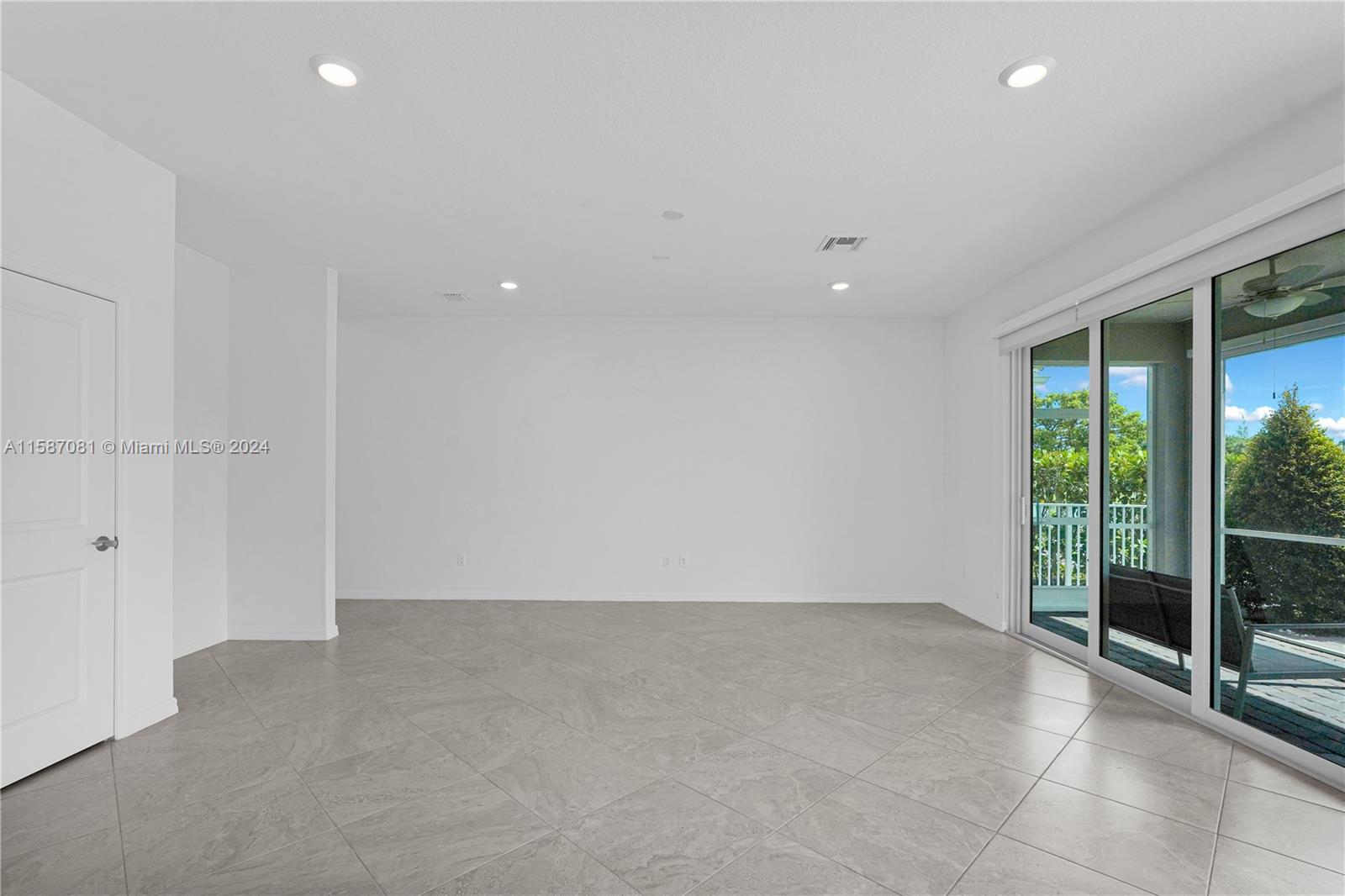 1595 Trailhead Terrace Hollywood, FL 33021 - Photo 5 of 49 a view of an empty room with glass door