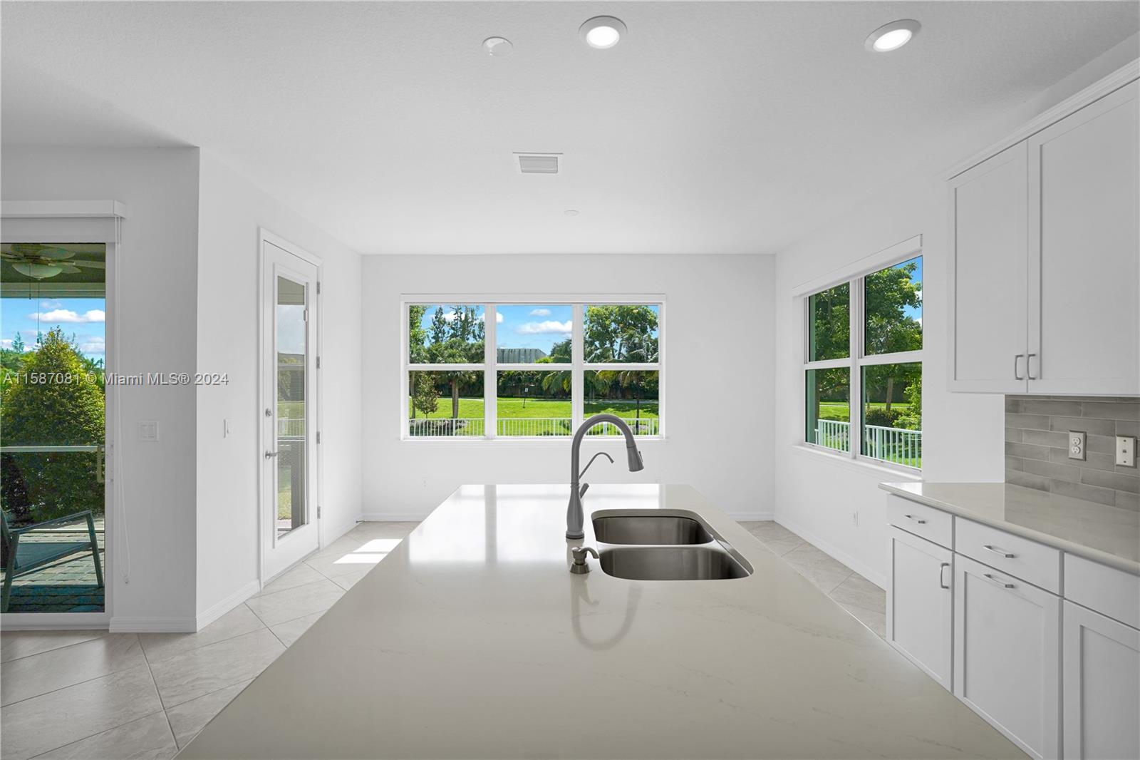1595 Trailhead Terrace Hollywood, FL 33021 - Photo 8 of 49 a kitchen with sink and large window