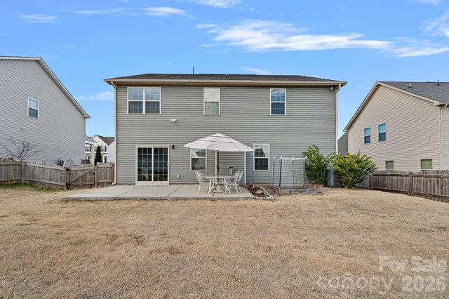 a front view of a house with patio