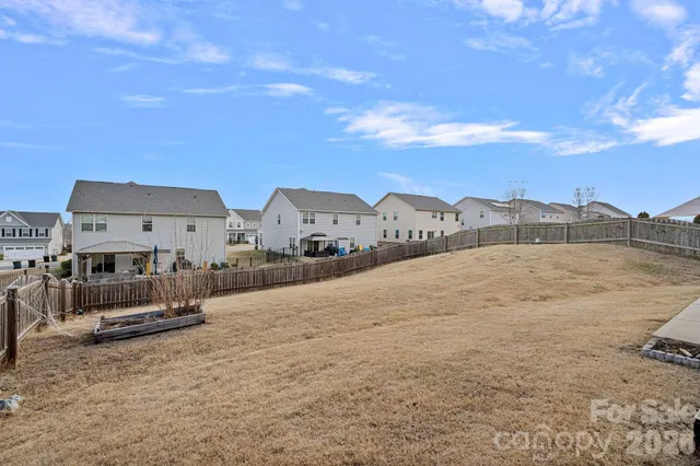 a view of houses with outdoor space