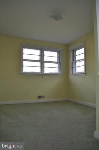 7915 Ruxway Road Towson, MD 21204 - Photo 2 of 14 an empty room with a window