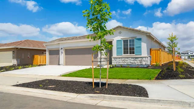 a house view with a garden space