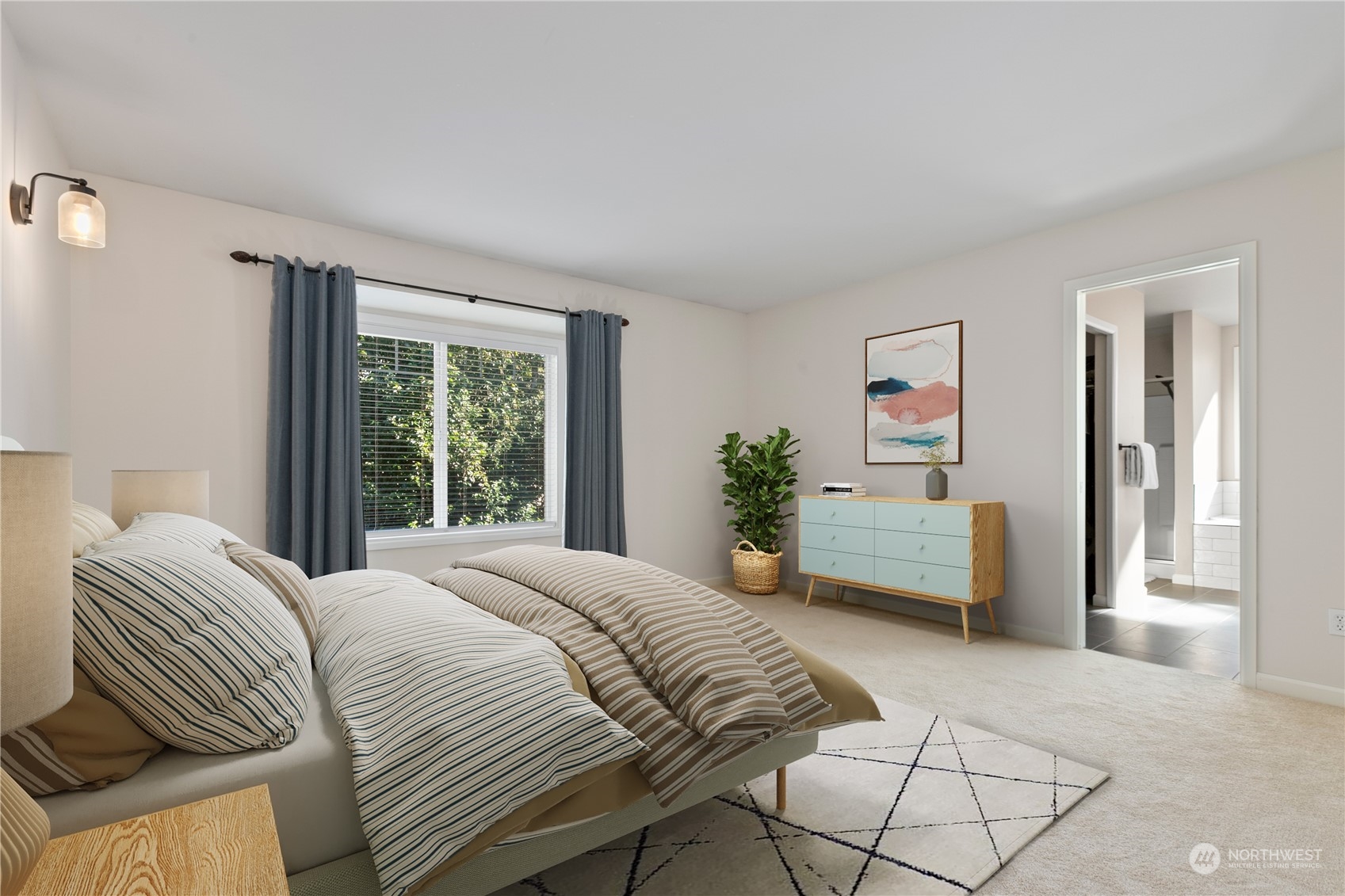 18205 27th Drive Southeast Bothell, WA 98012 - Photo 22 of 37 a bedroom with a bed and a couch