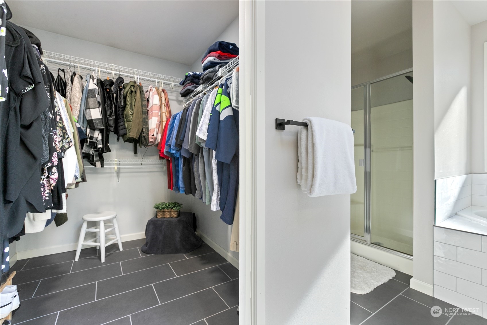 18205 27th Drive Southeast Bothell, WA 98012 - Photo 24 of 37 a view of walk in closet with clothes and shoes