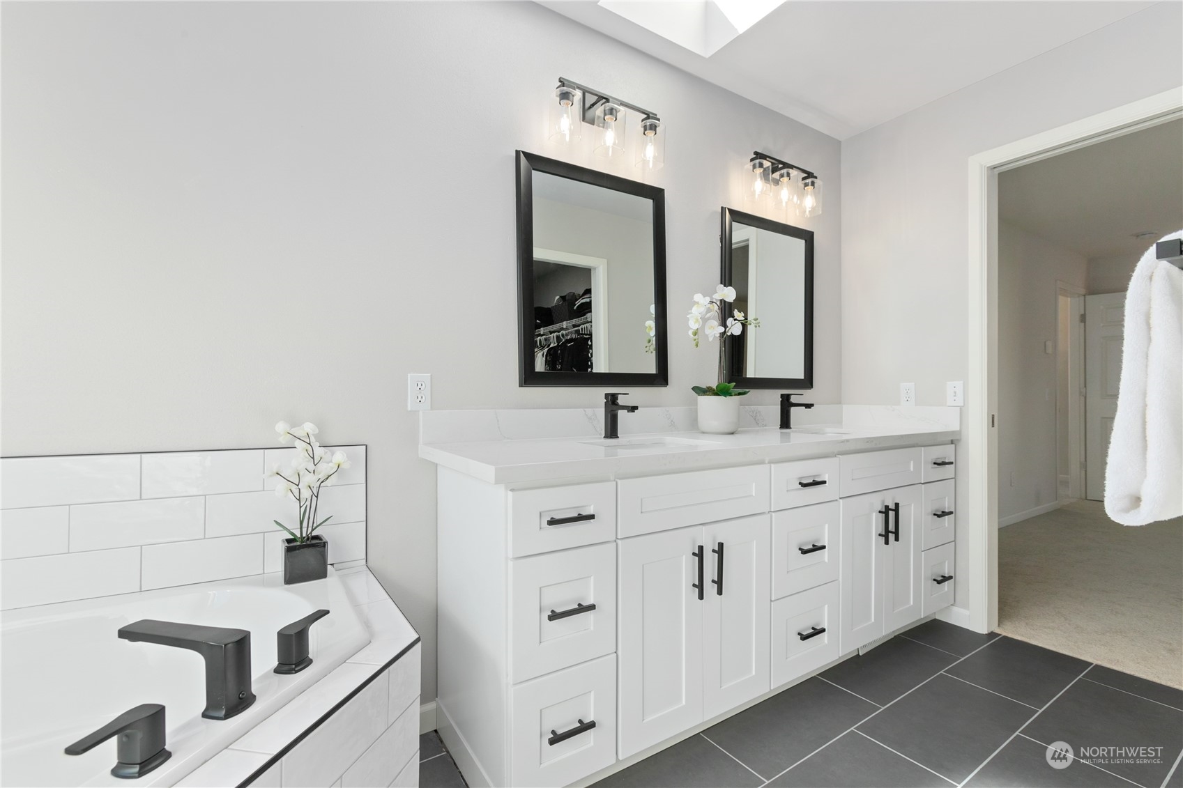 18205 27th Drive Southeast Bothell, WA 98012 - Photo 25 of 37 a bathroom with a double vanity sink mirror and