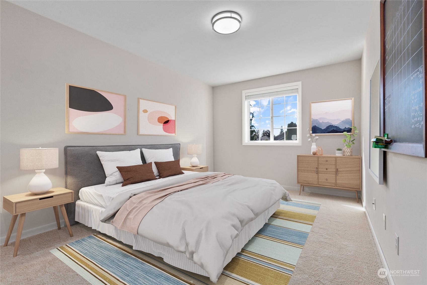 18205 27th Drive Southeast Bothell, WA 98012 - Photo 28 of 37 a bedroom with a bed and a painting on the wall