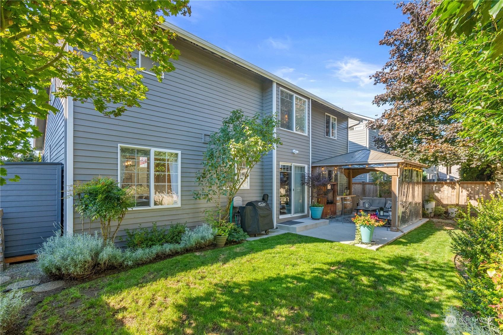18205 27th Drive Southeast Bothell, WA 98012 - Photo 31 of 37 a view of a house with a yard